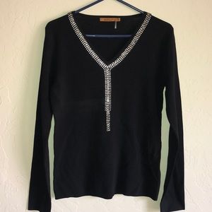 Women’s black sweater with rhinestones